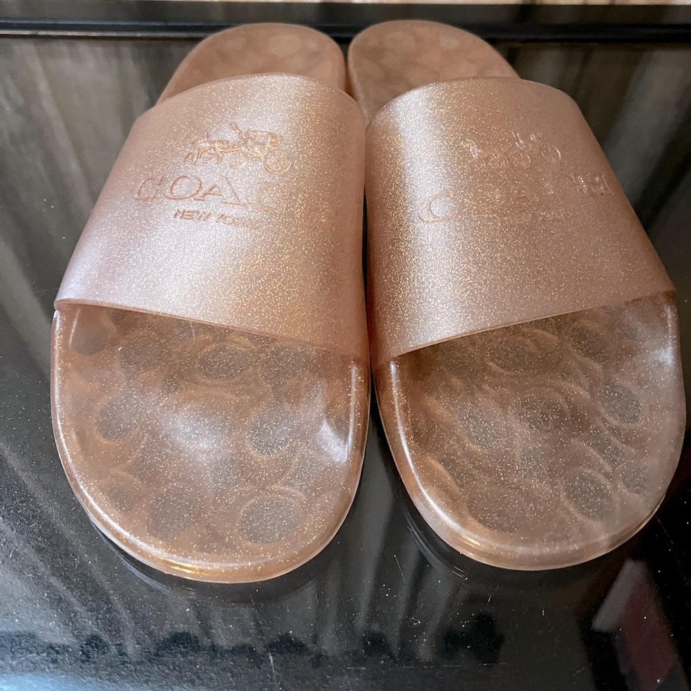 Coach slides.  Women’s size 11.  Rose/ Blush Pink.  Never worn.